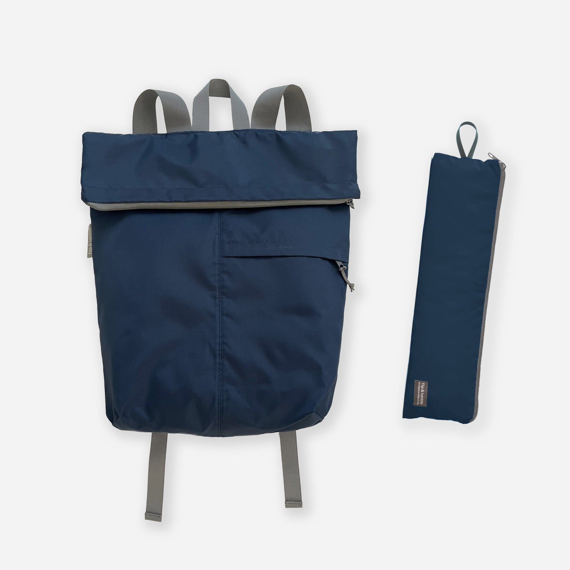 navy foldable backpack for travel - flip & tumble - best packable backpack for travel, this packable foldable rucksack style is great for travel